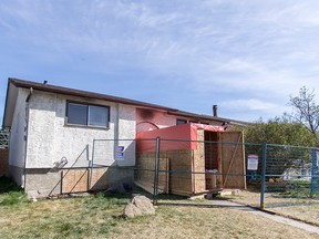 This home Marbank Way NE in Calgary has been hit by an arsonist at least four times in the past month. L/Postmedia Network