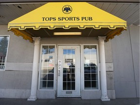 An exterior photo shows the entrance to Tops Sports Bar on 4 St NW on Wednesday May 4, 2016. Earlier that morning, a man was stabbed while attempting to intervene during an armed robbery at the business.