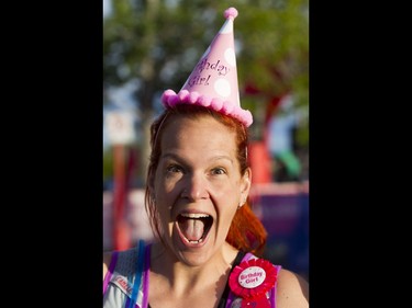 Birthday girl Su Davies can't wait to start the Calgary Marathon at the Stampede Grounds in Calgary, Alta., on Sunday, May 29, 2016. There were 5k, 10k, 21.1k, 42.2k and 50k distances in the race, including the half-marathon national championships. Lyle Aspinall/Postmedia Network