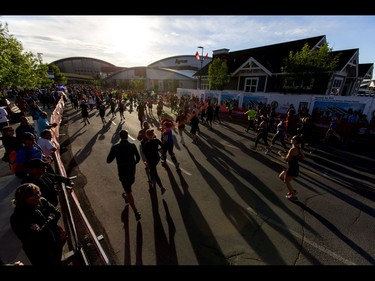 Runners cruise through the opening steps of the Calgary Marathon at the Stampede Grounds in Calgary, Alta., on Sunday, May 29, 2016. There were 5k, 10k, 21.1k, 42.2k and 50k distances in the race, including the half-marathon national championships. Lyle Aspinall/Postmedia Network