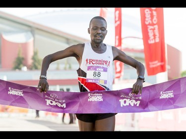 Daniel Kipkoech wins the men's 10-km portion of the Calgary Marathon at the Stampede Grounds in Calgary, Alta., on Sunday, May 29, 2016. There were 5k, 10k, 21.1k, 42.2k and 50k distances in the race, including the half-marathon national championships. Lyle Aspinall/Postmedia Network