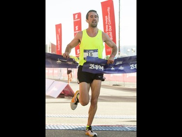 Thomas Toth wins the men's half-marathon during the Calgary Marathon at the Stampede Grounds in Calgary, Alta., on Sunday, May 29, 2016. There were 5k, 10k, 21.1k, 42.2k and 50k distances in the race, including the half-marathon national championships. Lyle Aspinall/Postmedia Network