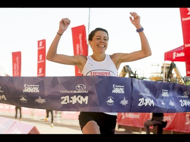 Emily Setlack wins the women's half-marathon during the Calgary Marathon at the Stampede Grounds in Calgary, Alta., on Sunday, May 29, 2016. There were 5k, 10k, 21.1k, 42.2k and 50k distances in the race, including the half-marathon national championships. Lyle Aspinall/Postmedia Network