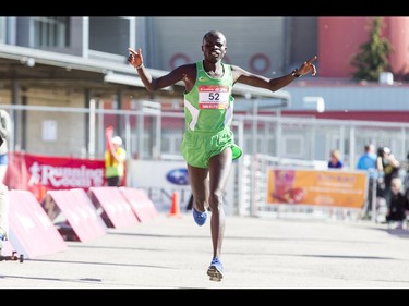 Jonathan Kipchirchir Chesoo of Kenya runs to victory in the Calgary Marathon at the Stampede Grounds in Calgary, Alta., on Sunday, May 29, 2016. There were 5k, 10k, 21.1k, 42.2k and 50k distances in the race, including the half-marathon national championships. Lyle Aspinall/Postmedia Network