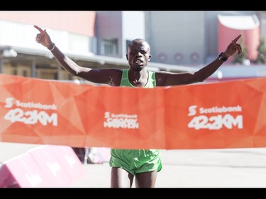 Jonathan Kipchirchir Chesoo of Kenya runs to victory in the Calgary Marathon at the Stampede Grounds in Calgary, Alta., on Sunday, May 29, 2016. There were 5k, 10k, 21.1k, 42.2k and 50k distances in the race, including the half-marathon national championships. Lyle Aspinall/Postmedia Network