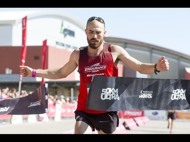 Jacob Puzey wins the 50-km ultra portion of the Calgary Marathon at the Stampede Grounds in Calgary, Alta., on Sunday, May 29, 2016. There were 5k, 10k, 21.1k, 42.2k and 50k distances in the race, including the half-marathon national championships. Lyle Aspinall/Postmedia Network
