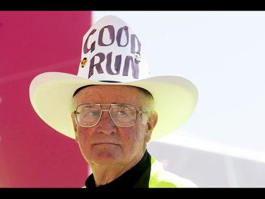 Race official Doug Kyle looks around during the Calgary Marathon at the Stampede Grounds in Calgary, Alta., on Sunday, May 29, 2016. There were 5k, 10k, 21.1k, 42.2k and 50k distances in the race, including the half-marathon national championships. Lyle Aspinall/Postmedia Network