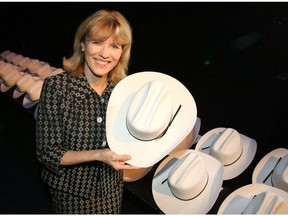Minister Tourism, Parks & Recreation, Cindy Ady, holds up a hat as she was attending  the 47th Annual Calgary White Hat Awards as we tip our hats to the city's best in the hospitality and tourism industry.