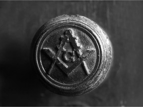 File art of a Freemason seal on an old doorknob.