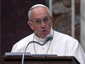 Pope Francis delivers his speech accepting the International Charlemagne Prize of Aachen (Karlspreis)  during a ceremony at the Vatican, Friday, May 6, 2016. Pope Francis, accepting the prize for promoting European unity on Friday bemoaned that the continent's people "are tempted to yield to our own selfish interests and to consider putting up fences." (Angelo Carconi/Pool photo via AP) ORG XMIT: XAP107