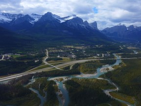 A view of the Trans-Canada Highway going through Canmore from an Alpine Helicopter.