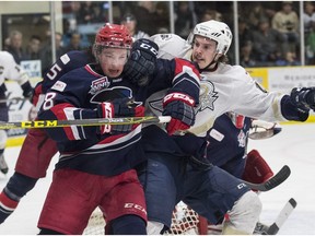 SPRUCE GROVE AB. APRIL 22, 2016 - Colton Leiter of the Spruce Grove Saints, tangles with Cale Makar of the Brooks Bandits in Game 5 of their AJHL playoff series at Grant Fuhr Arena in Spruce Grove. Shaughn Butts / POSTMEDIA NEWS NETWORK