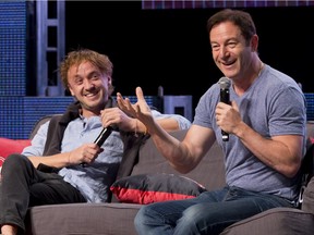 Jason Isaacs, right, and Tom Felton, the Malfoys from the Harry Potter films, speak during their panel during the Calgary Comic and Entertainment Expo at Stampede Park in Calgary, Alta., on Sunday, May 1, 2016.