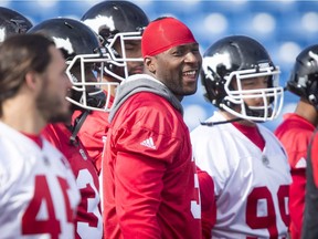 Jerome Messam has a laugh during the Calgary Stampeders training camp in Calgary, Alta., on Monday, May 30, 2016. The regular season begins on June 25, when the Stamps head to B.C. Lyle Aspinall/Postmedia Network