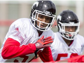 Tommie Campbell eyes a ball on Day 1 of the Calgary Stampeders rookie camp at McMahon Stadium in Calgary, Alta., on Thursday, May 26, 2016. Regular training camp was set to begin on May 29.  Lyle Aspinall/Postmedia Network