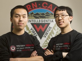 Western Canada High School students Richard Li, left, and Bryan Ma are the top winners of a student debate sponsored by the Sir Winston Churchill Society.