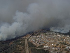 Aerial view of the wild fires in the Fort McMurray area from a CH-146 Griffon on May 4, 2016.