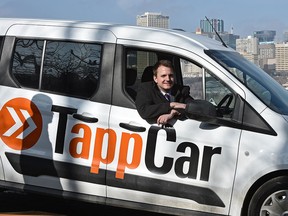 TappCar representative Pascal Ryffel is pictured in a TappCar vehicle in Edmonton, shortly before the service's launch in that city.
