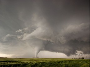 Tornado south of Dodge City, Kansas, shot by Braydon Morriseau of Cochrane, founding member of Prairie Storm Chasers.