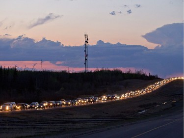 Traffic lines the highway as residents leave Fort McMurray  on Tuesday May 3, 2016.