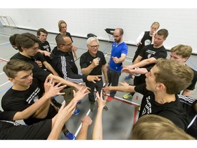 Assistant coach Brad Kilb calls in his crew during an under-16 Calgary Elite West Volleyball Club practice at the University of Calgary in Calgary, Alta., on Wednesday, May 11, 2016. The team will compete in the Volleyball Canada 16U West Championships from May 20 to 23, taking place at the Olympic Oval in Calgary. Lyle Aspinall/Postmedia Network