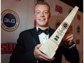 UofC Dinos quarterback Andrew Buckley speaks to media after winning the BLG Award for Male Athlete of the Year in Calgary, Ab., on Monday May 2, 2016. Mike Drew/Postmedia