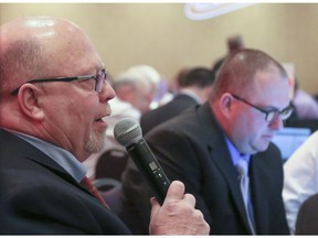 Aryn Toombs/Calgary Herald CALGARY, AB -- May 7, 2015 -- Dan Bonar, director of player personnel for the Calgary Hitmen, announcesa  Hitmen draft pick for the upcoming 2015-2016 WHL season at the Deerfoot Inn and Casino in Calgary on Thursday, May 7, 2015. (Aryn Toombs/Calgary Herald) (For Sports story by Laurence Heinen) 00065059A SLUG: 0507 WHL bantam draft - Deerfoot Casino