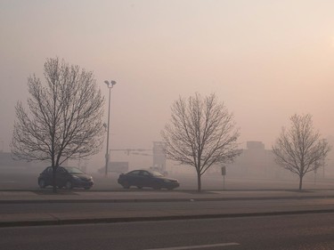 FORT MCMURRAY, AB - MAY 06:  Smoke from wildfires fill the morning air on May 6, 2016 in Fort McMurray, Alberta, Canada. Wildfires, which are still burning out of control, have forced the evacuation of more than 80,000 residents from the town.