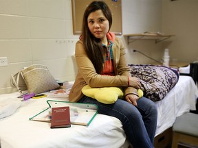 Temporary foreign worker Joann Gerebese, 34, fled the Fort McMurray wildfires and is now staying at the University of Calgary dorms in Calgary on Thursday, May 12, 2016. Gerebese is from the Philippines and has worked in the city for two years.