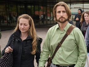 FILE PHOTO: David and Collette Stephan leave the courthouse in Lethbridge, Alberta, April 26, 2016, surrounded by family and supporters after being found guilty in failing to provide the necessaries of life in the death of their 19-month-old Ezekiel 2012.