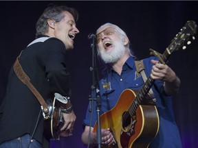 Jim Cuddy, Greg Keelor and Blue Rodeo perform during the Fire Aid For Fort McMurray concert at Commonwealth Stadium, in Edmonton on June 29. The Band plays the Canadian Badlands Passion Play Amphitheatre on Saturday.