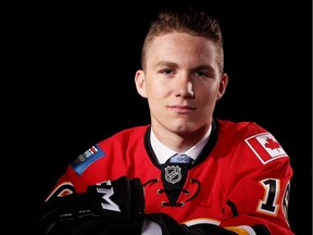 Matthew Tkachuk poses for a portrait after being selected sixth overall by the Calgary Flames in round one during the 2016 NHL Draft on June 24, 2016 in Buffalo, New York.
