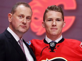 BUFFALO, NY - JUNE 24:  Matthew Tkachuk celebrates with the Calgary Flames after being selected sixth overall during round one of the 2016 NHL Draft on June 24, 2016 in Buffalo, New York.