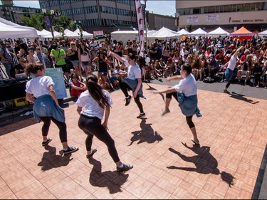 Dancers from Decidedly Jazz Dance Works perform at the annual 4th Street Lilac Festival in Calgary, Ab., on Sunday June 5, 2016. Mike Drew/Postmedia