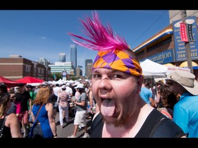 Matt Eyre has tons of fun at the annual 4th Street Lilac Festival in Calgary, AB., on Sunday June 5, 2016. Mike Drew/Postmedia