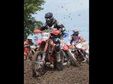 Motocross riders try to get ahead of the pack at the Redbull Chasing Limits Motocross competition in Calgary on June 26, 2016.