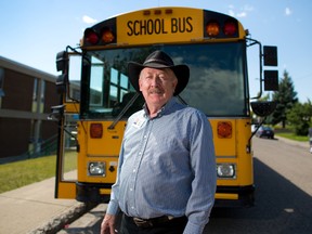 Retiring Calgary school bus driver Monty Moore stands beside his bus before his last run on Tuesday June 28, 2016. Monty, who is 71 years old, bridged his retirement from a 30 year desk job by driving a school bus. He says it's the best job he's ever had.