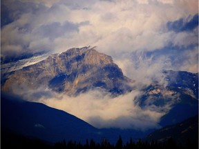 A storm rolls in over the mountains in Kananaskis Country.