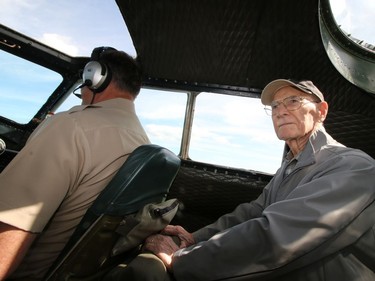 94 year-old Canadian World War II veteran Doug Curtis sits in the cockpit during a flight in Aluminum Overcast, a B-17 Flying Fortress at Springbank Airport outside Calgary on Wednesday June 22, 2016. The WW II bomber is owned by the U.S. based Experimental Aircraft Association who will take people on flights in the vintage aircraft. Flights are used as a fundraiser for the organization to help restore and maintain vintage aircraft. Curtis was a Royal Air Force tail gunner in a Lancaster bomber who flew on the B-17 Wednesday.