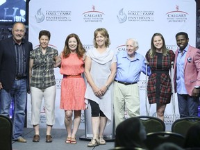 The 2016 inductees into the Canadian Sports Hall of Fame, from left, Bryan Trottier, hockey, Annie Perreault, speed skating, Colleen Jones, curling, Sue Holloway, cross country skiing and kayak, Dr. Frank Hayden, builder, Special Olympics, Stephanie Dixon, para-swimming and Mike (Pinball) Clemons, football, at the Canadian Sports Hall of Fame at Canada Olympic Park in Calgary on June 22, 2016.