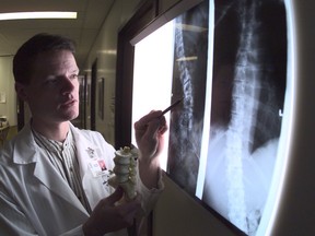 An archive photo of neurosurgeon Dr. John Hurlbert in 1997, when he co-founded the University of Calgary spine program.