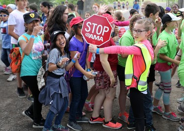 Olivia Sharpe from St. Philip school conducts a demonstration crossing during a fun-filled day appreciation day at Heritage Park on Thursday June 9, 2016 for AMA School Safety Patrollers. Patrollers have been keeping kids safe in crosswalks for 79 years since 1937.
Gavin Young/Postmedia