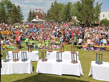 Some of the over 7000 Calgary AMA School Safety Patrollers gather for an awards ceremony during a fun-filled day appreciation day at Heritage Park on Thursday June 9, 2016. Patrollers have been keeping kids safe in crosswalks for 79 years since 1937.