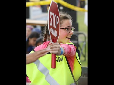 Olivia Sharpe from St. Philip school conducts a demonstration crossing during a fun-filled day appreciation day at Heritage Park on Thursday June 9, 2016 for AMA School Safety Patrollers. Patrollers have been keeping kids safe in crosswalks for 79 years since 1937.