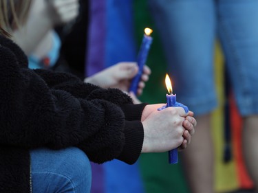 Calgarians take part in a vigil in Olympic Plaza  on Sunday evening June 12, 2016 for the victims of the Pulse Nightclub shooting in Orlando.