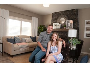 Alex and Sophie in the McKee show home in Vista Crossing, Crossfield.