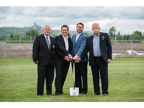 From left, Deputy Mayor Ward Sutherland, Jaydan Tait, vice-president of  infill communities at Brookfield Residential, CEO and president of West Campus Development Trust James Robertson and Truman Homes president George Trutina at the site where University District will be built.