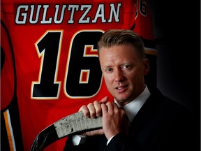 Calgary Flames new head coach Glen Gulutzan, poses for a portrait inside the Flames dressing room at the Scotiabank Saddledome in Calgary, Alta., on June 17, 2016.