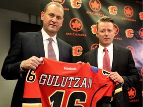 Calgary Flames new head coach Glen Gulutzan, right, and general manager Brad Treliving during a press conference in Calgary on June 17, 2016.