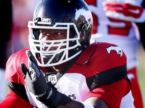 Charleston Hughes of the Calgary Stampeders during warm up before playing the Edmonton Eskimos in CFL football in Calgary, Alta., on Saturday, June 11, 2016. AL CHAREST/POSTMEDIA